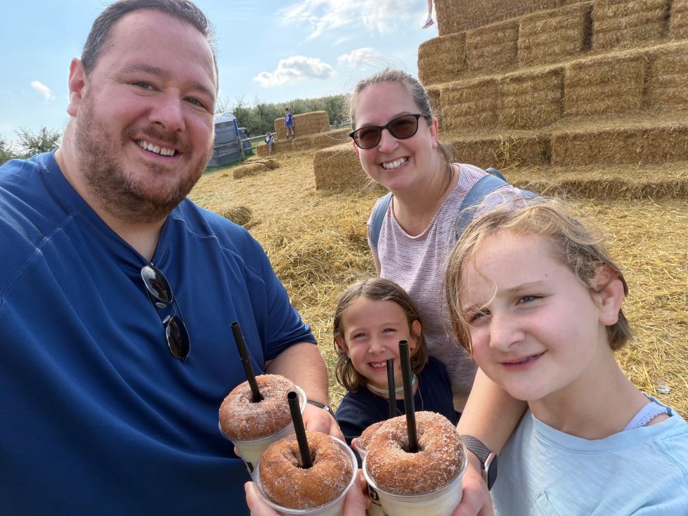 Allison Just with her husband and two daughters.