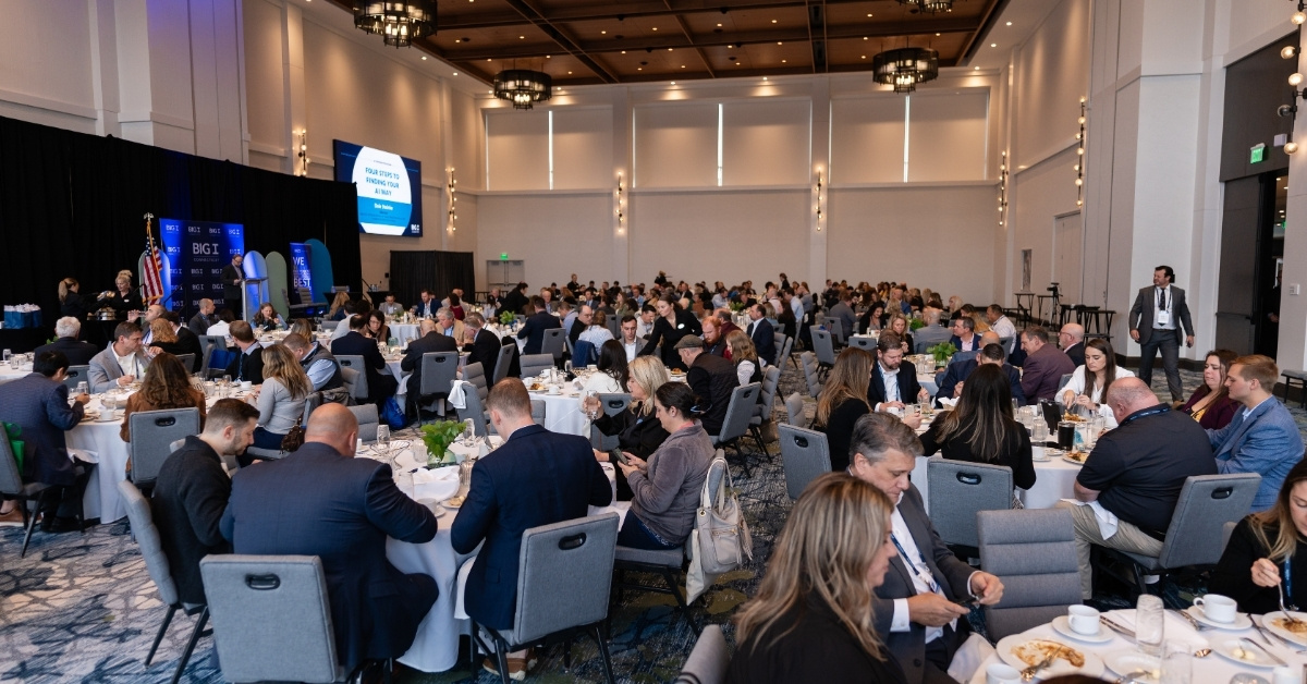 Wide view of the luncheon ballroom with attendees sitting in their chairs at CONNECT 2025.