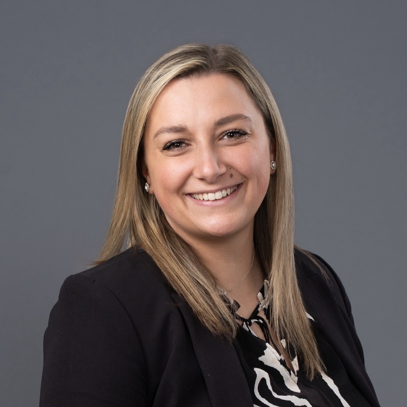 Headshot of Cara Mayhew.