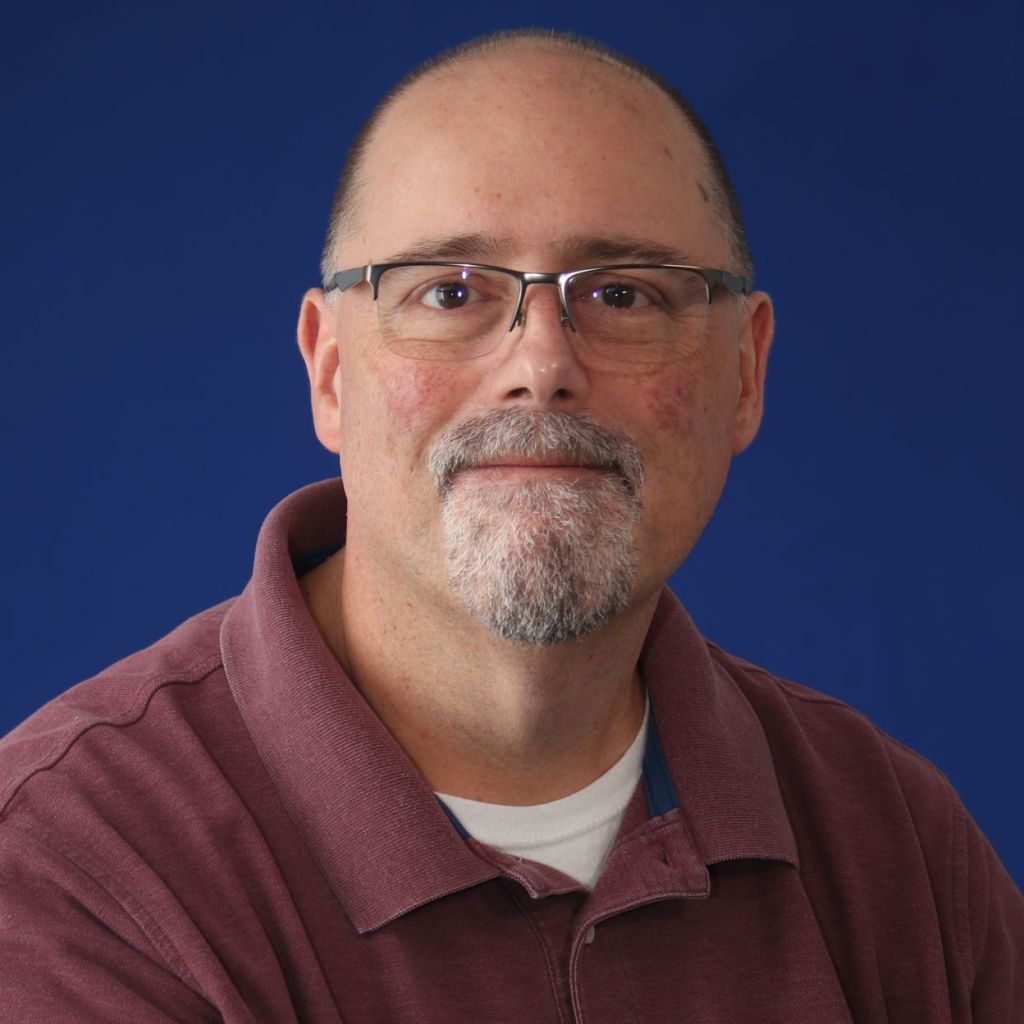 Headshot of Eric Miller.