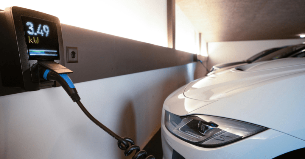 Image of an electric car plugged into the charging station