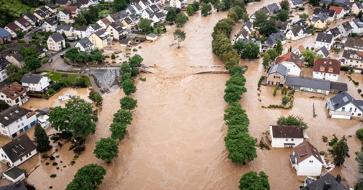 An aerial view of a flooded town.