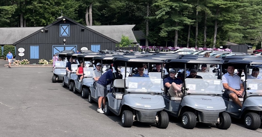 Rows of golfers in their golf carts preparing to drive to their hole at the Big I CT Golf Tournament 2025.