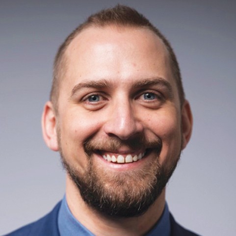 Headshot of Ryan Smith.