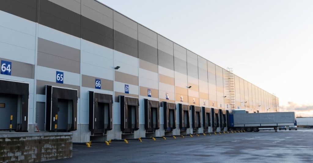 Outside view of a commercial building's warehouse loading docks.