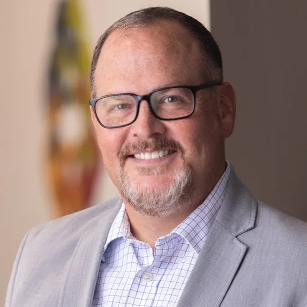 Headshot of Eric Kuhen.